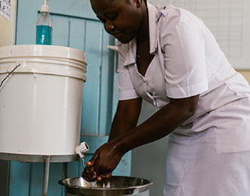 Jackeline Gideon Mwiguta, a nurse/midwife at the Nyarugusu Dispensary in the Geita Region of Tanzania