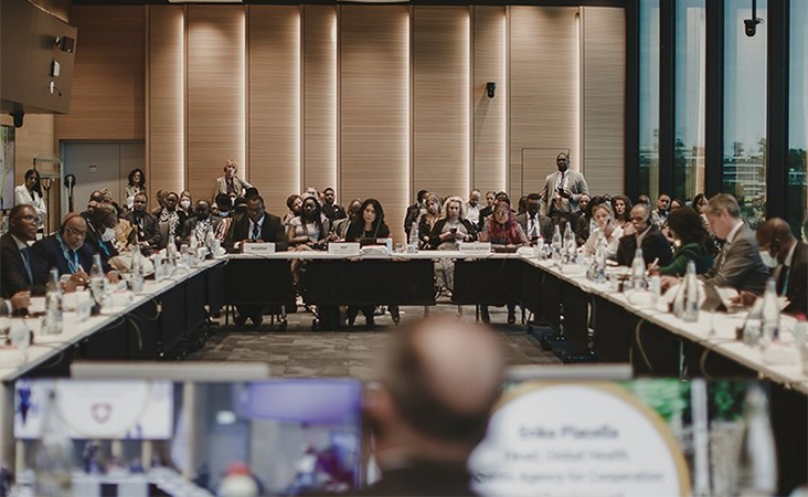 Participants listen to remarks from Dr Tedros Adhanom Ghebreyesus, Director-General of WHO, during the 2022 GTFCC Side Event in observance of WHA