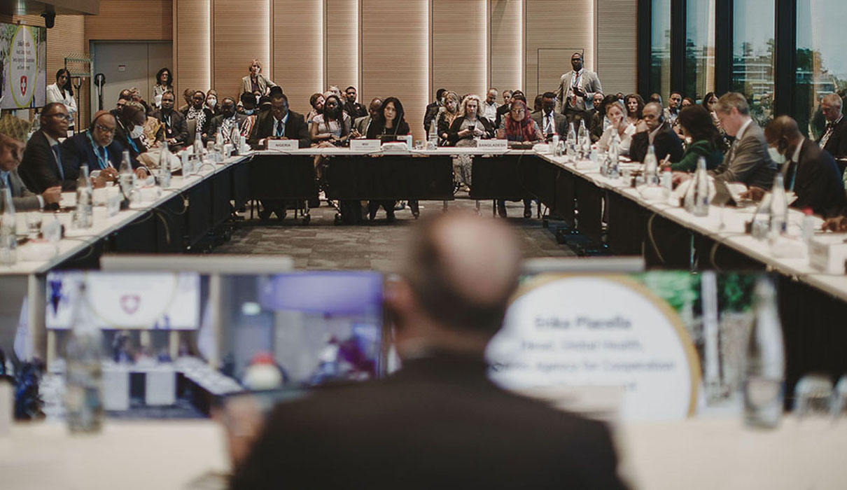 A speaker presenting to attendees at a GTFCC event
